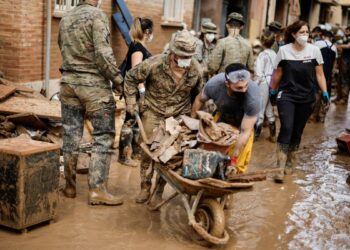 Una fotografía de la tragedia de la DANA subraya el mensaje de Felipe VI en el Palacio Real